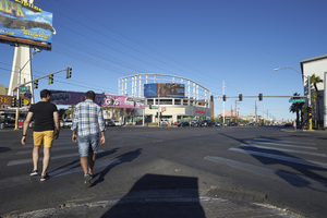 Pedestrians crossing Las Vegas Boulevard at West Sahara Avenue, looking north, Las Vegas, Nevada: digital photograph