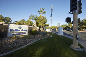 Apartment complex sign on the corner of Grand Canyon Drive and West Sahara Avenue, looking west, Las Vegas, Nevada: digital photograph