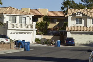 Single family housing next to multi-family housing off Fort Apache Road and West Sahara Avenue, Las Vegas, Nevada: digital photograph