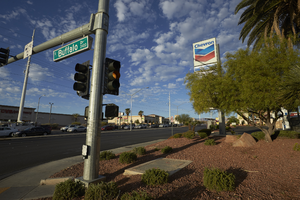Gas station sign on West Sahara Road at Buffalo Drive, looking southwest, Las Vegas, Nevada: digital photograph