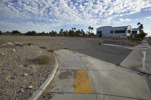 Sidewalks and undeveloped land on West Sahara Avenue east of Buffalo Drive, Las Vegas, Nevada: digital photograph