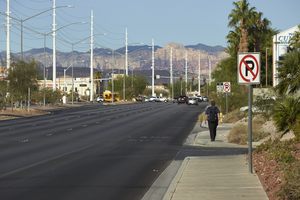 Pedestrian on sidewalk along West Sahara Avenue east of Buffalo Drive, looking west, Las Vegas, Nevada: digital photograph