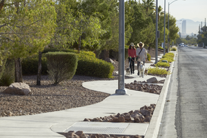 Pedestrians on sidewalks along Loredo Street, looking east, Las Vegas, Nevada: digital photograph