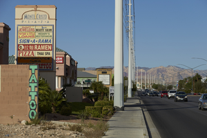 Signs and power poles along West Sahara Avenue west of Tenaya Way, looking west, Las Vegas, Nevada: digital photograph