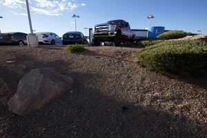 Truck on display at auto dealership on West Sahara Avenue east of Buffalo Drive, looking south, Las Vegas, Nevada: digital photograph