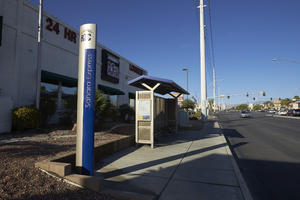 Bus stop and commrecial development on West Sahara Avenue east of Buffalo Drive, looking west, Las Vegas, Nevada: digital photograph