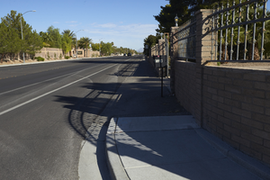 Sidewalk and block wall at private residence along Cimarron Road north of West Sahara Avenue, looking north, Las Vegas, Nevada: digital photograph