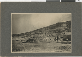 Three people in a mining camp: photographic print