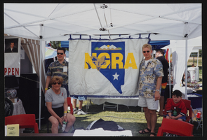 Unidentified people at the Nevada Gay Rodeo Association booth at Gay Pride: photographic print