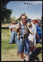 Dennis McBride poses with a boa constrictor at Gay Pride: photographic print