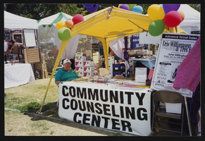 Unidentified woman at the Community Counseling Center booth at Gay Pride: photographic print
