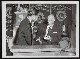 C. Norman Cornwall (right) at a Lions Club function: photographic print