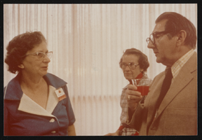 Alice Brown, Dorothy Winter, and Ralph Roske (identified from left to right) at reception: photographic print