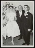 Albert S. Henderson (center) with Mr. and Mrs. Kopels, a couple he married: photographic print