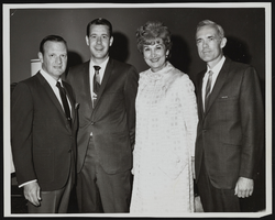 Judy Bailey with three unidentified men likely from the American Cancer Society: photographic print