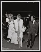 An unidentified man, Joan Shoofey, Judy Bayley, and Larry duBoef (identified from left to right): photographic print