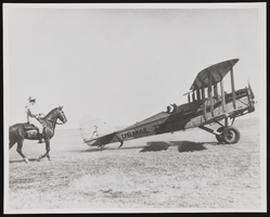 U.S. mail airplane and horse with rider: photographic print