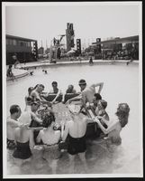 Publicity stunt featuring a floating craps table at the Sands: photographic print