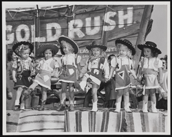 Little girls in cowgirl outfits performing on a float in the Helldorado Parade in Las Vegas, Nevada: photographic print