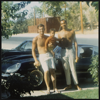 Jack Daly (Marie's son) holding Jeff McMiIllan with James McMillan, Jr.: photographic print