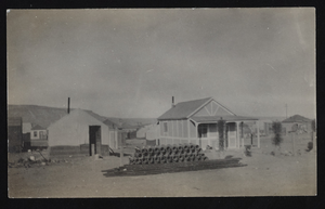E. R. Lord's house (right) and Frank Benham's tent (left): photographic print