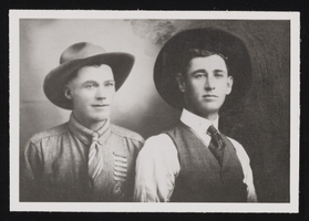 Luther Swanner and Earl Wright wearing rodeo medals: photographic print