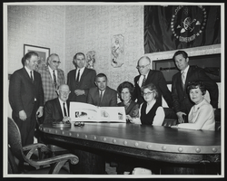 Park Commission meets with Governor Paul Laxalt and presents him with Valley of Fire Master Plan. Standing from left to right: Bill Wood, Assistant Administrator Nevada Park System; Elmo de Ricco, Director Department of Conservation; Eve Cronkhite, State Parks Administrator; Chris Sheering, Nevada State Park Advisory Commission, and Bob Forson. Seated (from left to right): Colonel Tom Miller, Chairman; Governor Paul Laxalt; Thalia Dondero; Jean Ford, and Audrey Harris: photographic print
