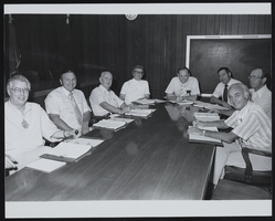 View of Erle A. Taylor, John Brown, George Monahan, Roland Westergard, Bill Blackmer, Bill Adams, Thurman White, and Jack Parvin (identified from left to right): photographic print