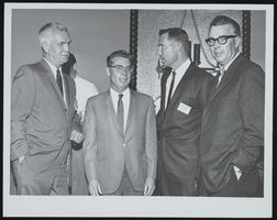 View of Bruce Beckley, Sid Whitmore, Art Wells, and Erle A. Taylor (identified from left to right): photographic print