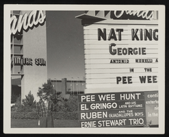 Antonio Morelli in front of the Sands Hotel marquee advertising Nat King Cole and Antonio Morelli: photographic print