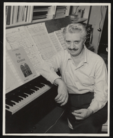 Antonio Morelli at his piano with the musical score, "Music for Christmas": photographic print