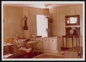 Jeanne Janish in the living room of her home: photographic print