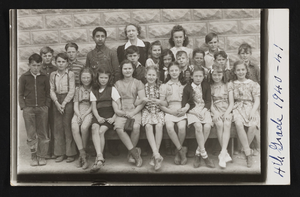 Hazel Denton posed for class photograph with fourth grade students: photographic prints