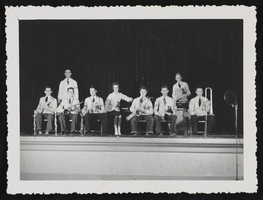 Lincoln County High School student orchestra on stage holding instruments: photographic print