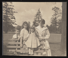 Victor, Nanelia, and Victoria Siegfried with Lou-Vee Siegfried on a bench at Volunteer Park in Seattle, Washington: photographic print