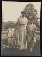 Lou-Vee Bradford Siegfried pictured with her children, Victor, Victoria, and Nanelia (identified from left to right): photographic print