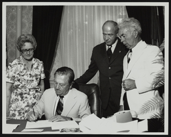 Howard Cannon, his wife Dorothy Pace Cannon, and Nevada Governor Mike O'Callaghan with Secretary of State William Swackhammer during the filing for Senator Cannon's fourth term: photographic print
