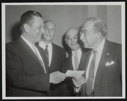 Howard Cannon with three unidentified men: photographic print