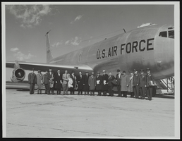 Howard Cannon posed in an airfield with others at the Air Force Ballistic Missile Headquarters, X-15 Test Facility in Los Angeles, California: photographic print