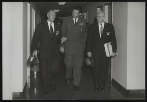 Men walking in a hallway at Air Force Ballistic Missile Headquarters: photographic print