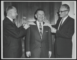 Howard Cannon is congratulated by Lieutenant General Bernard Schriever and Senator Strom Thurmond on Cannon's promotion to Brigadier General: photographic print