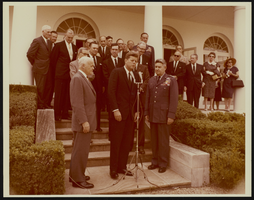 Howard Cannon with others at the White House swearing in ceremony for General Curtis LeMay with President John F. Kennedy officiating: photographic print
