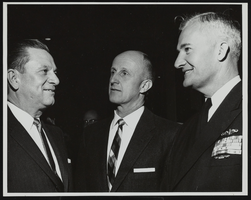 Howard Cannon, Edward R. Folsom, and Rear Admiral Ignatius J. Galantin speaking to each other: photographic print