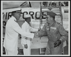 Rear Admiral F. J. Brush greets Howard Cannon immediately following his landing at Naval Station Mayport, Jacksonville, Florida: photographic print