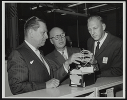 Howard Cannon speaking with two other men: photographic print