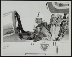 Howard Cannon seated in an aircraft in flight gear: photographic print