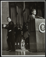President John F. Kennedy's visit to Las Vegas, Nevada with Howard Cannon in the background: photographic print