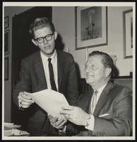 Howard Cannon is shown with George Clark, Senate intern: photographic print