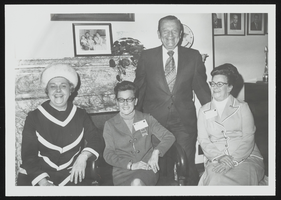 Howard Cannon with Business and Professional Women representatives Hope Roberts, Minnie Alderman, and Marian Elliott: photographic print