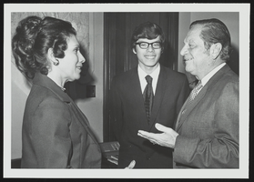 Howard Cannon meets with Mrs. Adolph Gutierrez and her son, Jake: photographic print